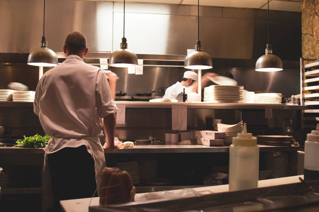 Chef preparing food in a commercial kitchen
